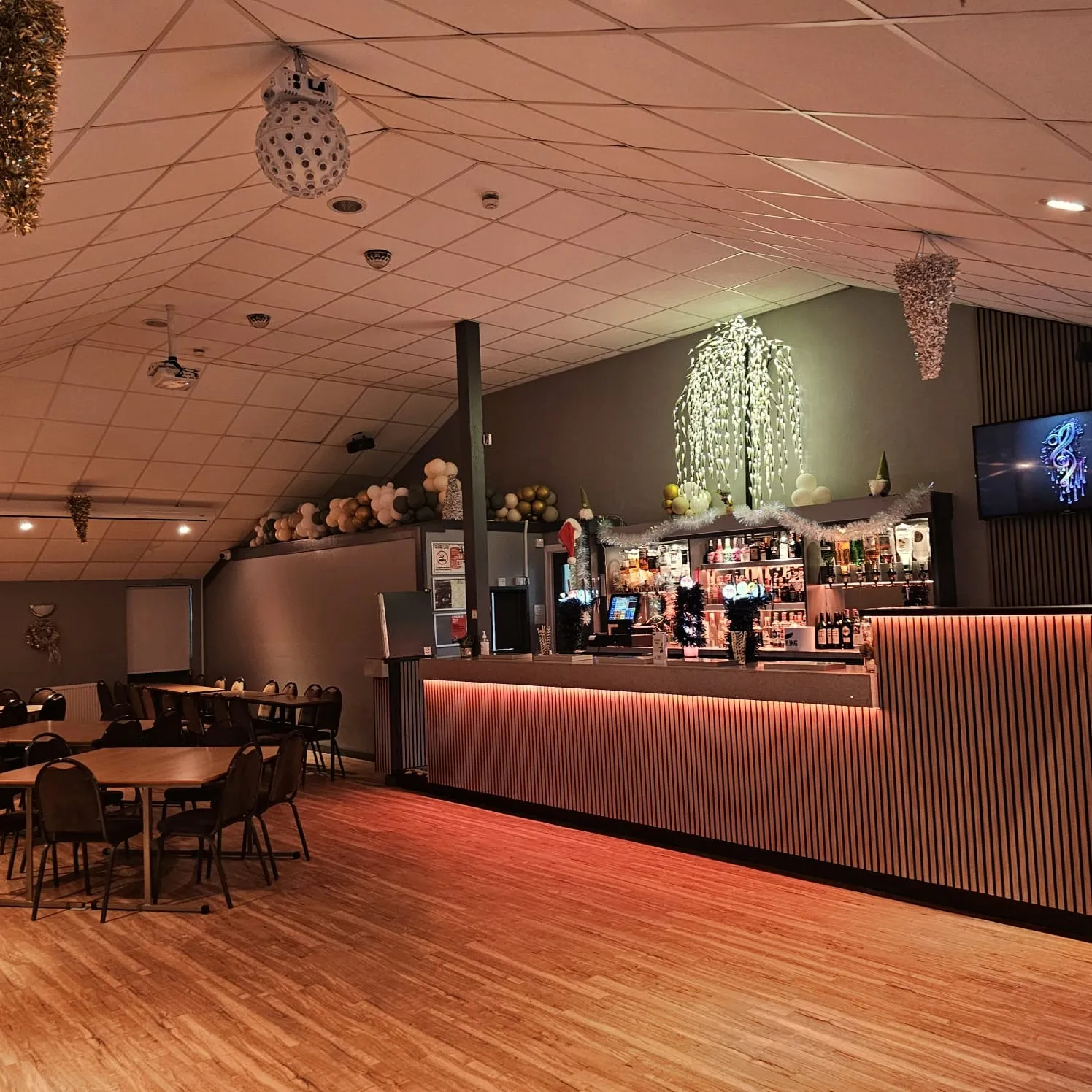 The bar in the evening under warm lighting