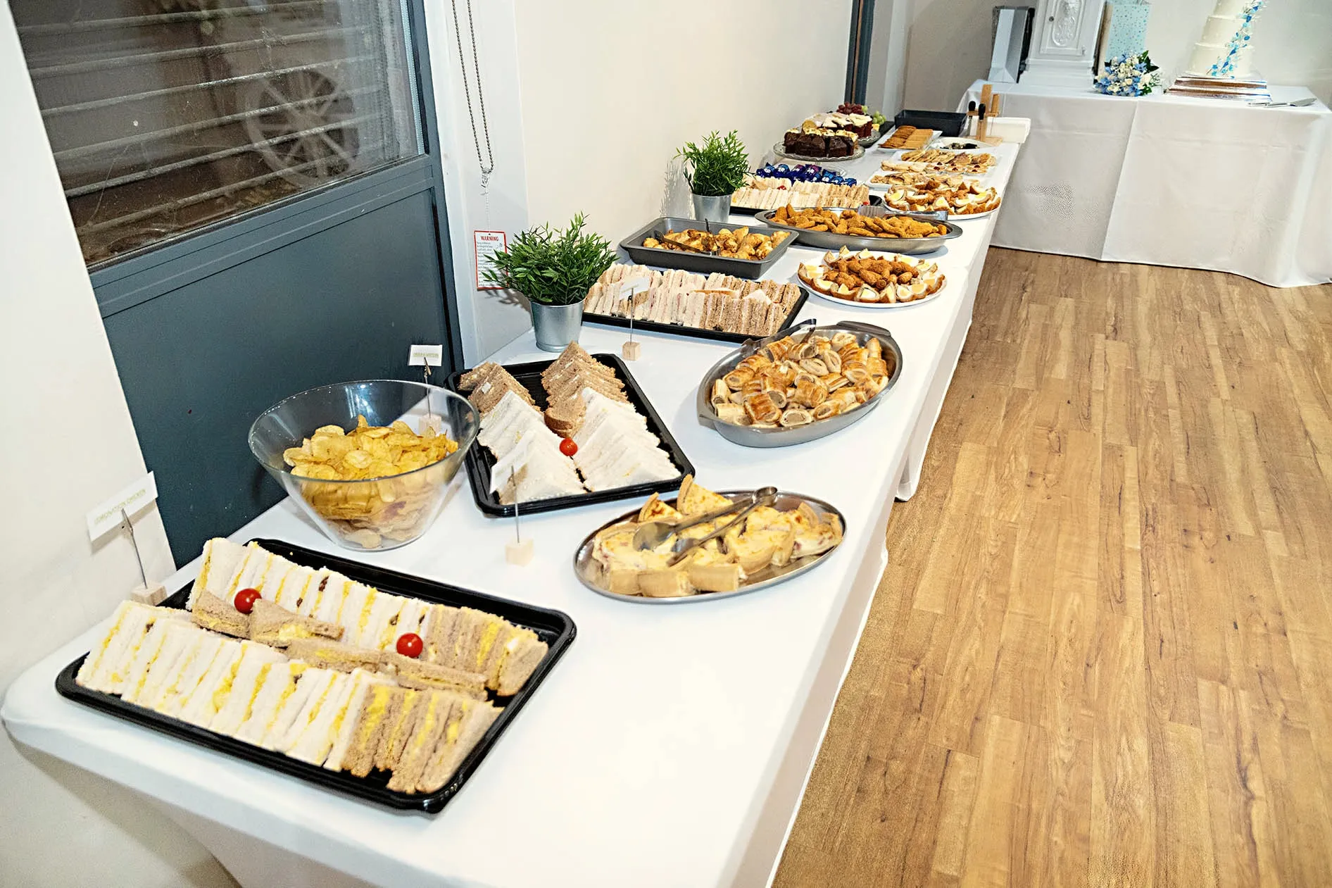 Buffet table of sandwiches, pastries and savouries