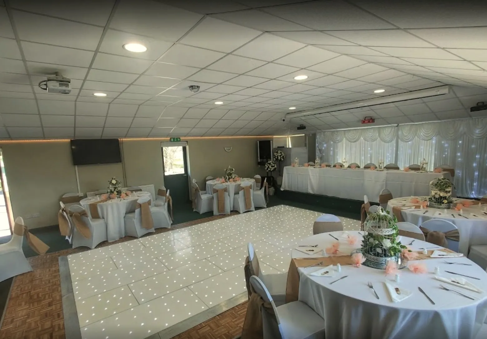 Round tables set around the dancefloor