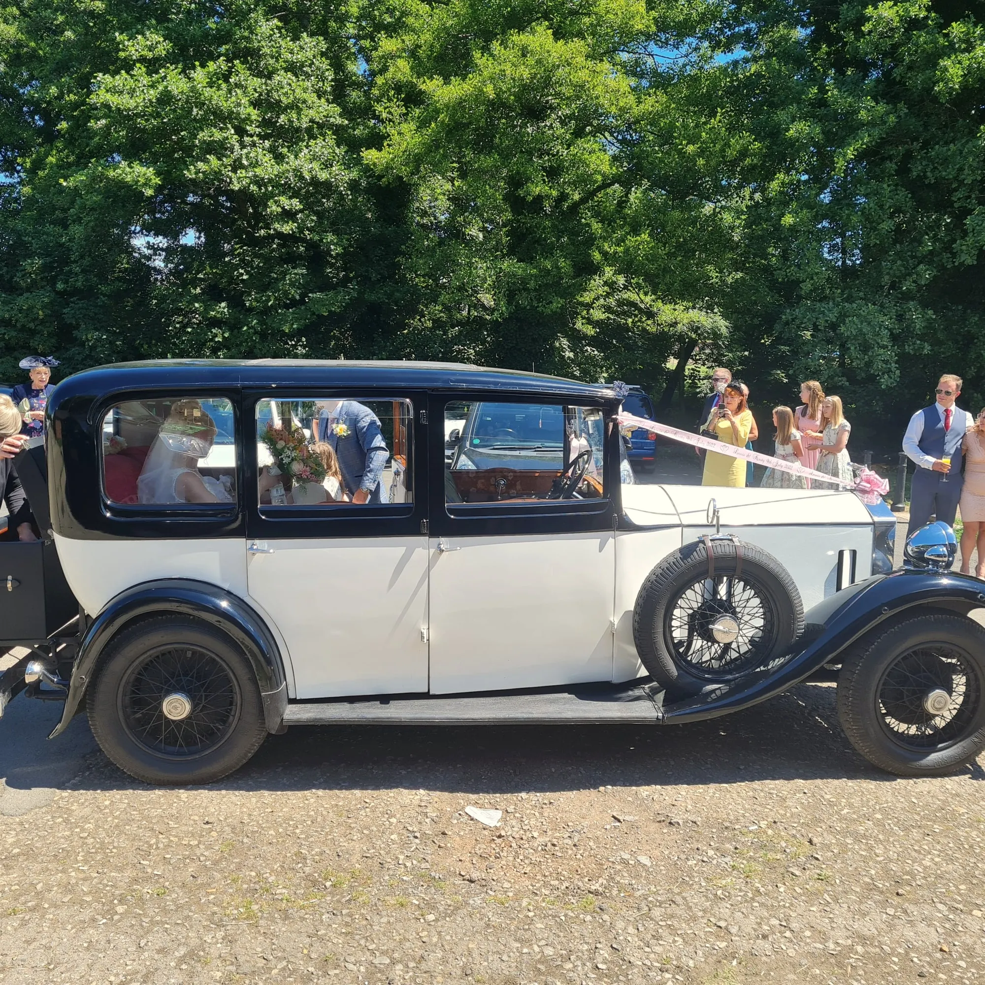 Vintage wedding car outside the venue